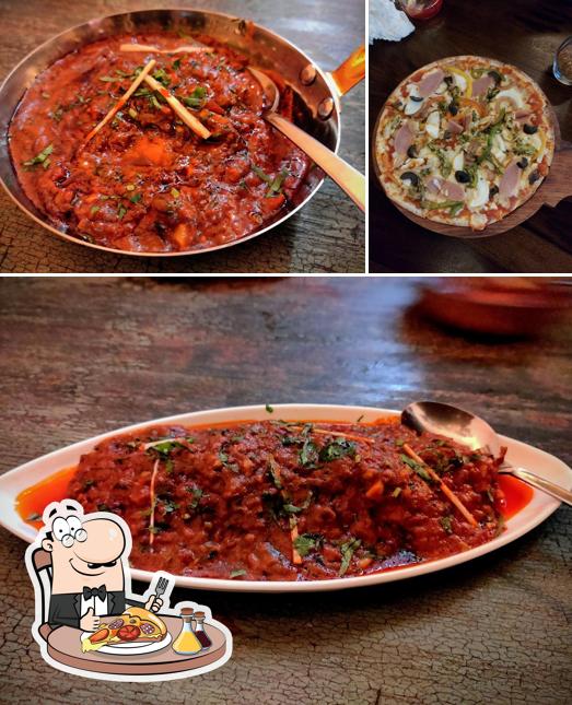 Get pizza at Sherlock s Lounge and Kitchen