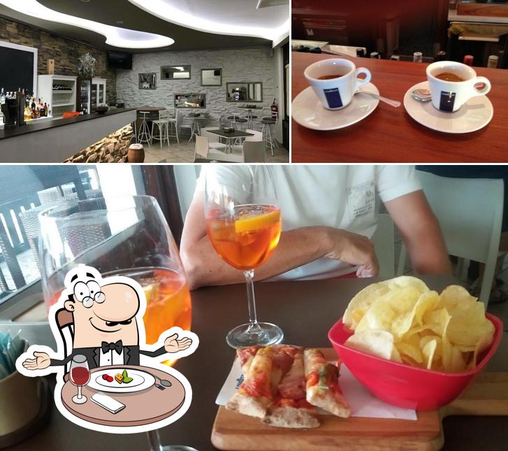 Bar Centrale si caratterizza per la tavolo da pranzo e interni