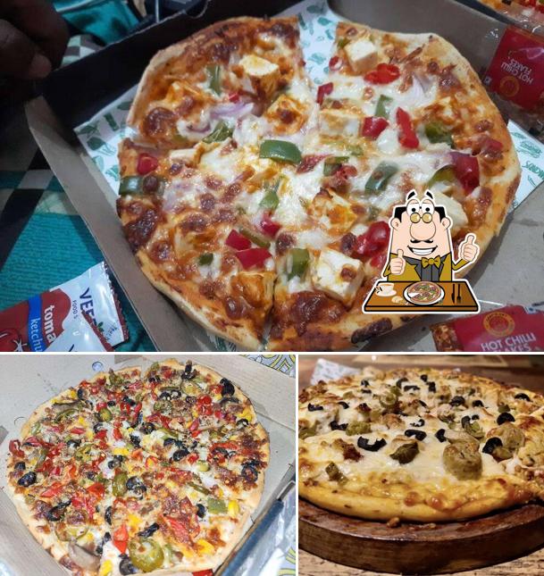 Try out pizza at Escobar's Shack