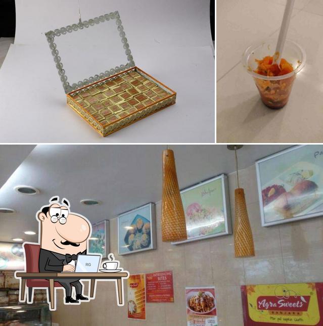 Check out the photo depicting interior and beverage at Agra Sweets Banjara - Since 1951