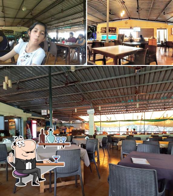 Take a seat at one of the tables at Darya Deger Restaurant