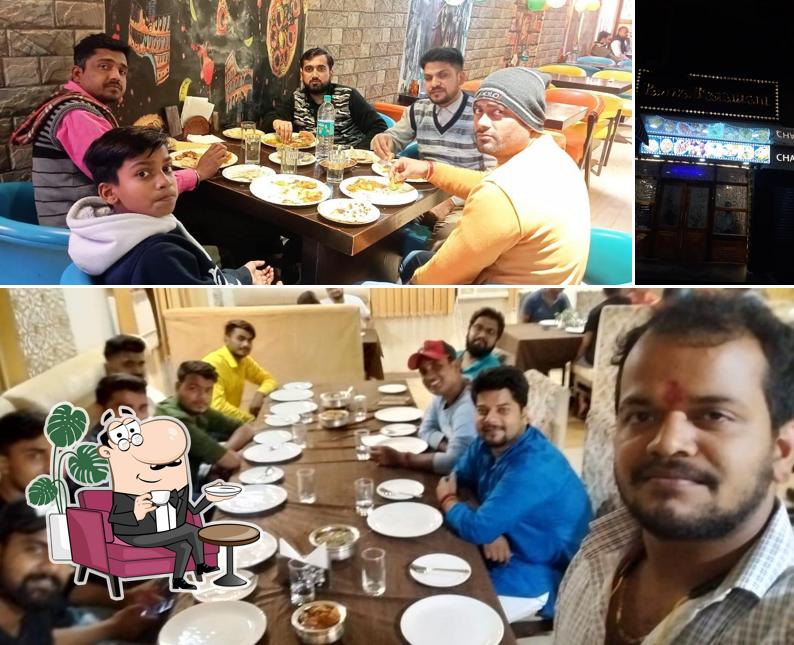 Take a seat at one of the tables at Pahwa Restaurant