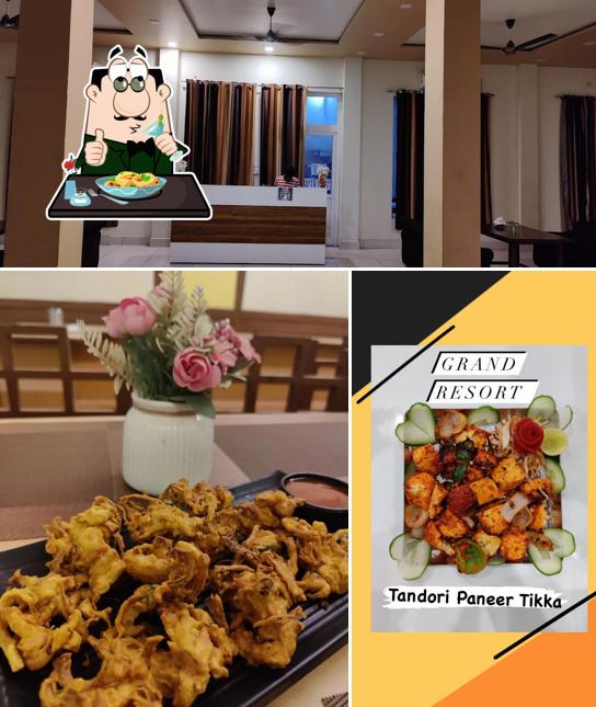 Check out the image showing food and interior at Grand Resort