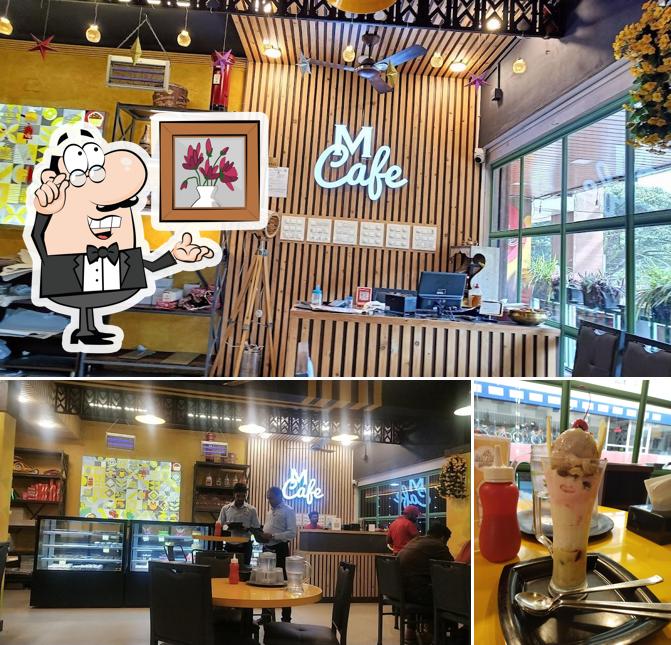 This is the picture displaying interior and beverage at MCafe Multi Cuisine Restaurants- Lunch home in Kundapura & Kundapura Chicken Special