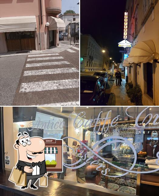 Questa è la foto che presenta la esterno e interni di Antico Caffè Trieste