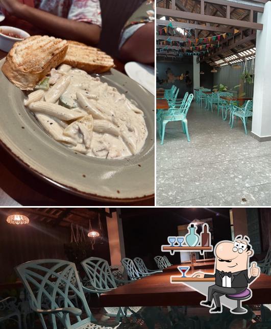 Check out the image displaying interior and food at Happy Cup Heritage, Kaloor