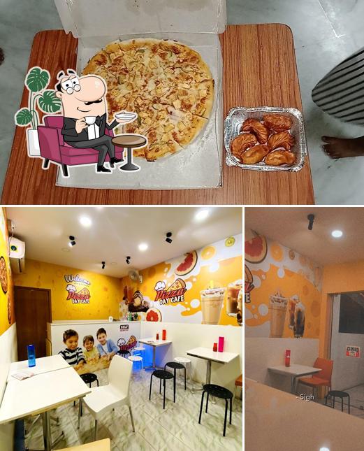 The interior of Pizza Day Cafe Sirkali