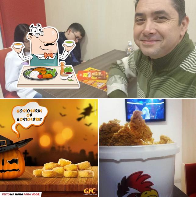 A imagem do GFC Frango Frito’s comida e mesa de jantar