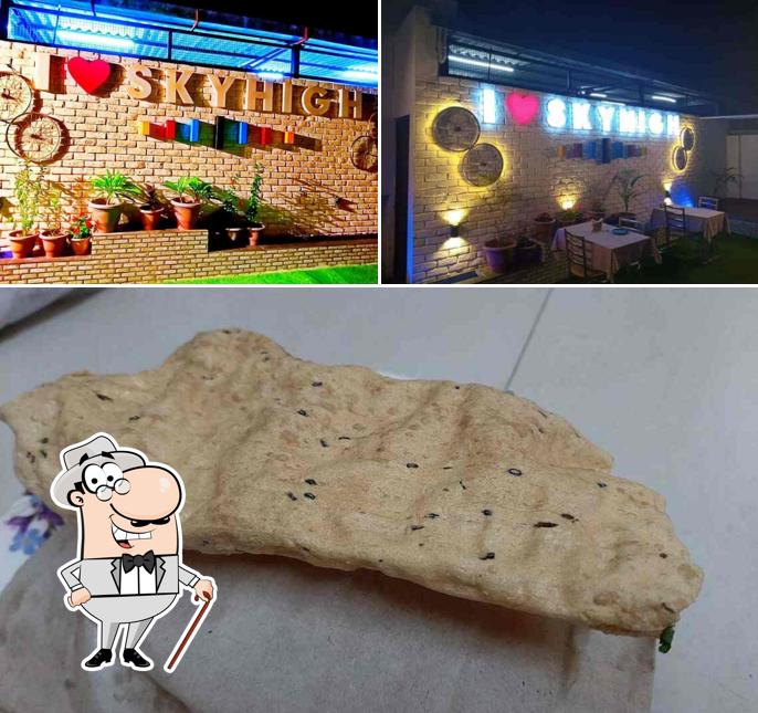 The picture of exterior and food at Sky High Restaurant & Terrace Cafe