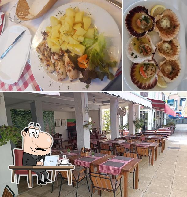 Siediti a un tavolo di RESTAURANT AL MARE NOVIGRAD