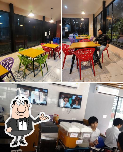 Take a seat at one of the tables at Shiru Cafe - IIT ROORKEE