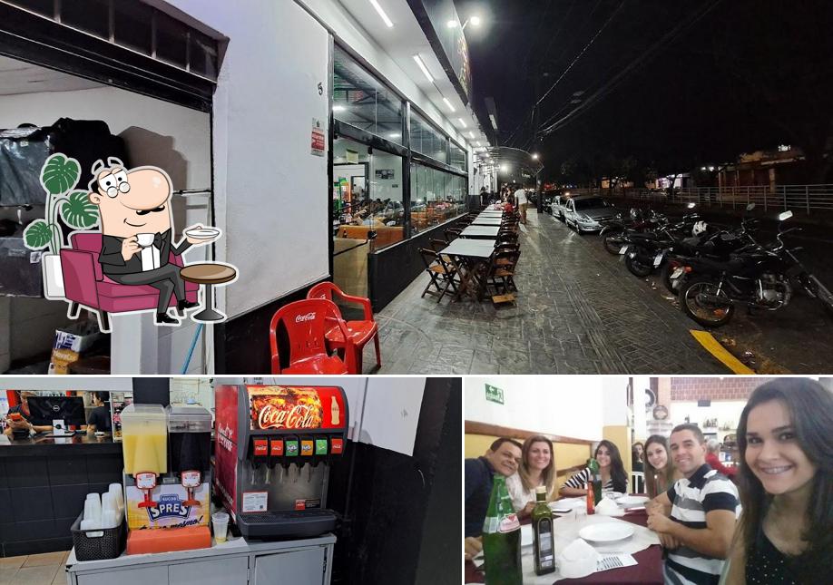 Dê uma olhada a imagem ilustrando interior e exterior no Pizzaria Três Irmãos