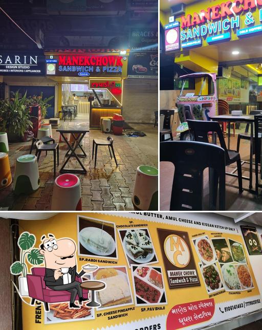 Take a look at the photo depicting interior and food at ManekChowk Sandwich and pizza Vastrapur
