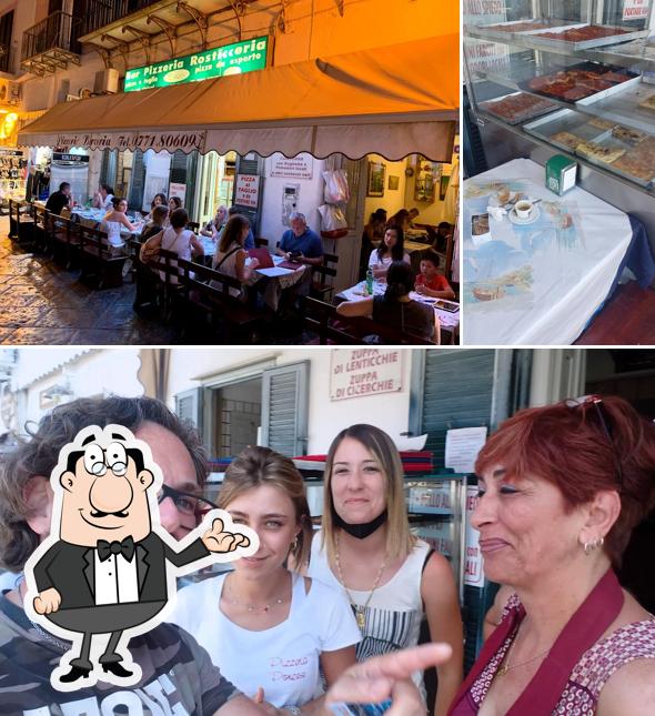Dai un'occhiata agli interni di Pizzeria Rosticceria Ponzese