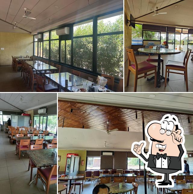 Take a seat at one of the tables at Shiv Shakti Dhaba