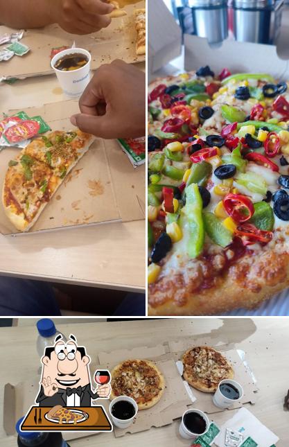 Try out pizza at Domino's Pizza Bandigowda Layout, Bengaluru