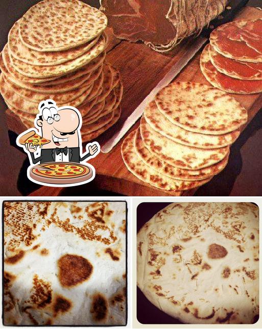 Prova una pizza a Cafè Maior - Bar/Piadineria
