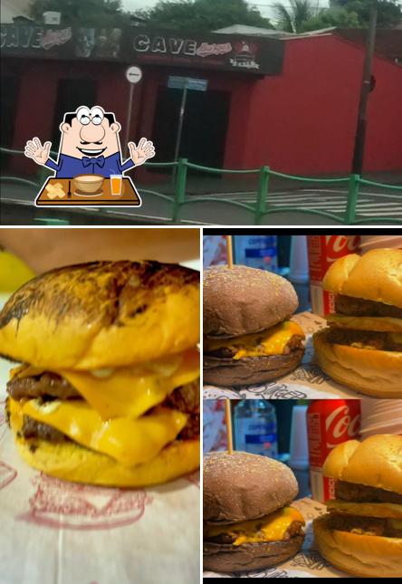 A ilustração da comida e exterior no Cave Burger