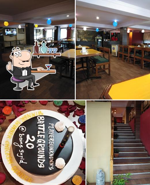 Take a seat at one of the tables at The Kurrypot Restaurant