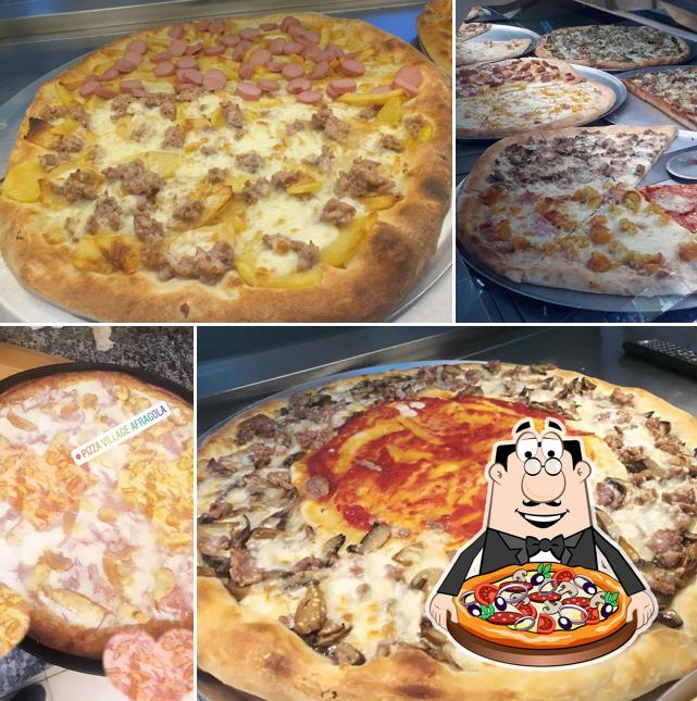 Prenditi una pizza a Pizza Village
