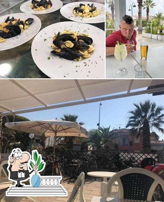 La foto della esterno e cibo di Chalet il Gabbiano