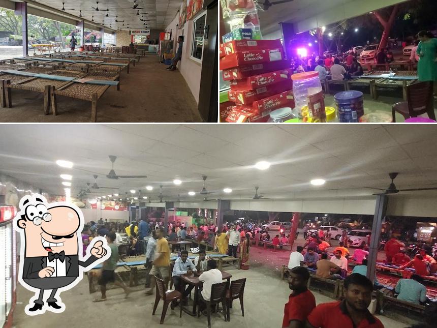 Take a seat at one of the tables at Delight Dhaba