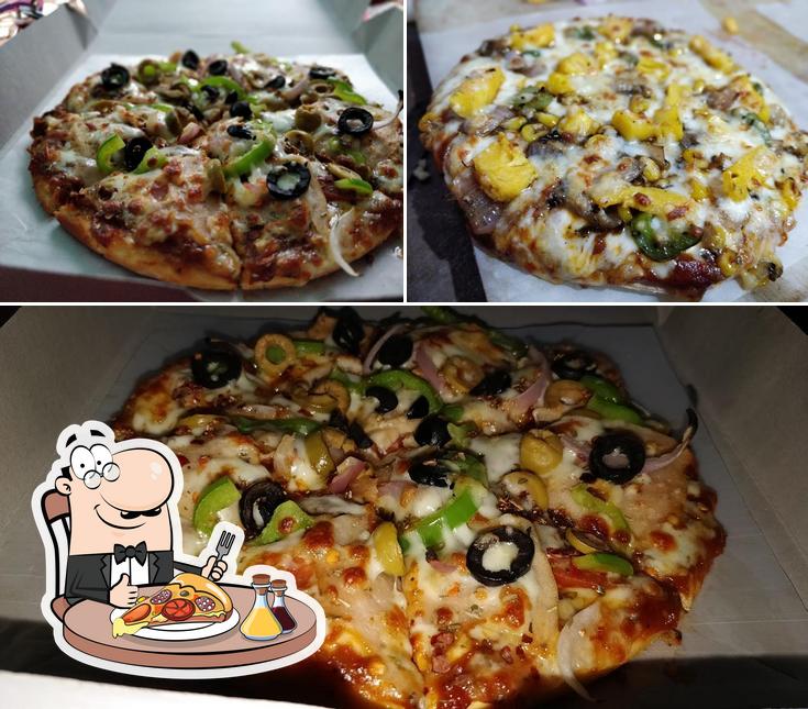 Pick pizza at Hotel Spice Story & Crazy Icecream Dristributer