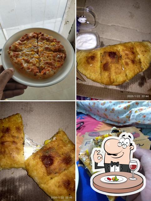 Food at The King Of Pizza