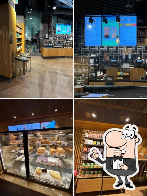 Dai un'occhiata agli interni di Starbucks Gate B