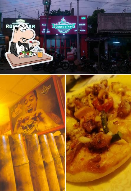 The photo of food and exterior at Pizza Capucino, Tennur