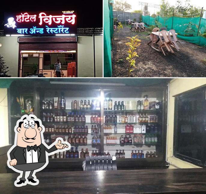 The photo of interior and exterior at Hotel Shraddha Bar & Restaurant