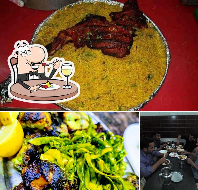 Among various things one can find food and dining table at Salva, Kalyan