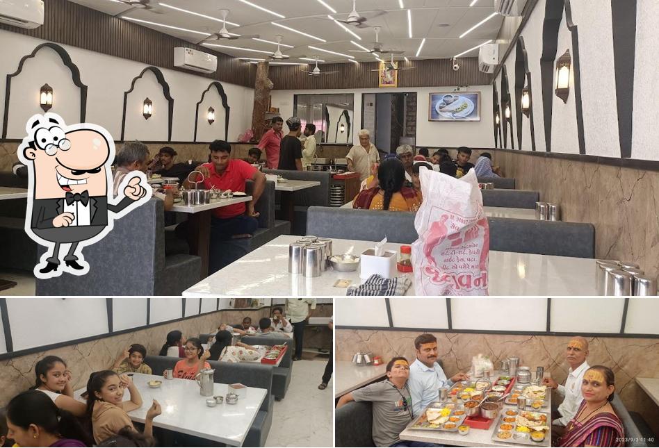 Take a seat at one of the tables at Kant Dining Hall & Restaurant