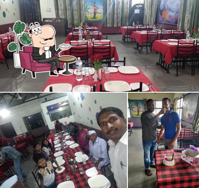 Take a seat at one of the tables at Hotel Phoenix in