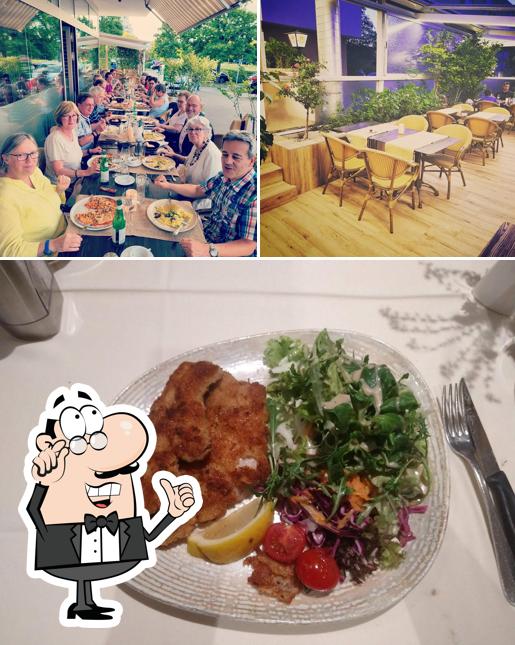 Dai un'occhiata agli interni di BONANZA Münchenstein Restaurant Pizzeria