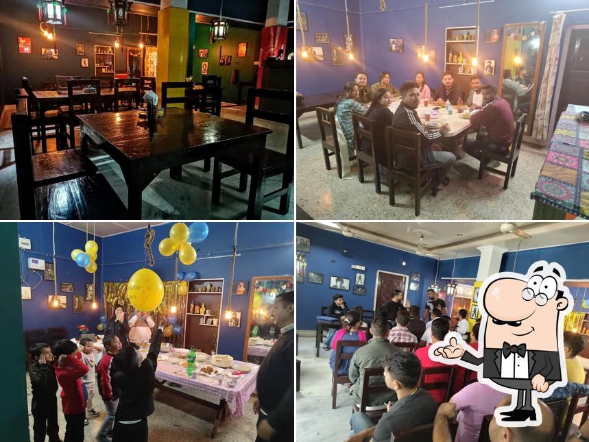 Take a seat at one of the tables at Nampong Restaurant Nagaon