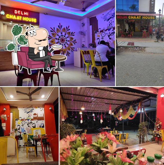 Take a seat at one of the tables at Delhi Chaat House Since 2017