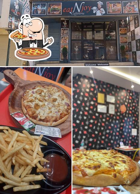 Get pizza at Eat N Joy Cafeteria