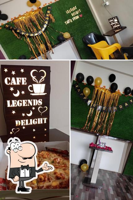 Check out the photo displaying interior and pizza at Cafe Legends Delight