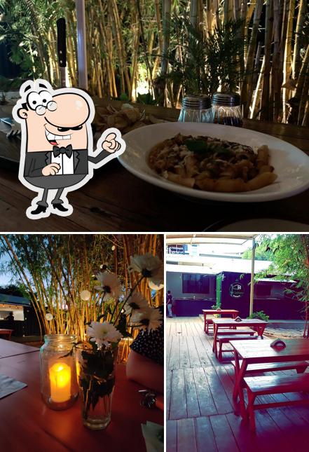 Check out the picture depicting interior and dining table at The Lettuce Haus