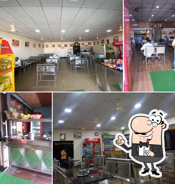 Take a seat at one of the tables at Hotel Panchakuti Udupi family Restaurant