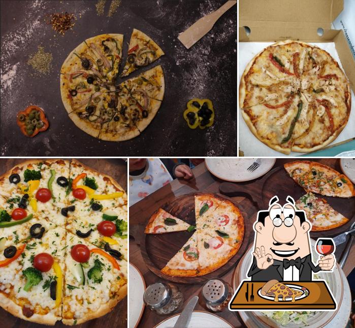 Pick pizza at Cheese & More The Kitchen