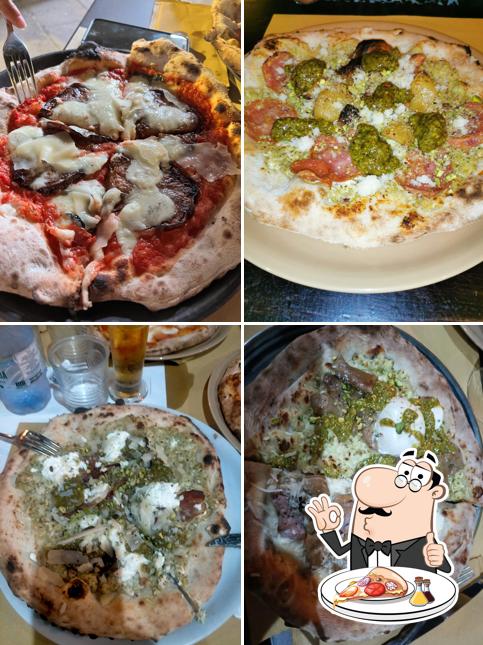A Rustico Steakhouse e Pizzeria, puoi ordinare una bella pizza