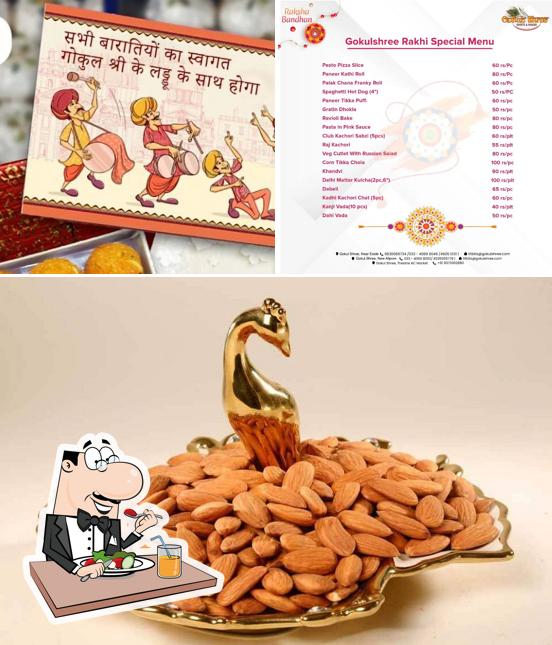 Check out the picture depicting food and interior at Gokul Shree