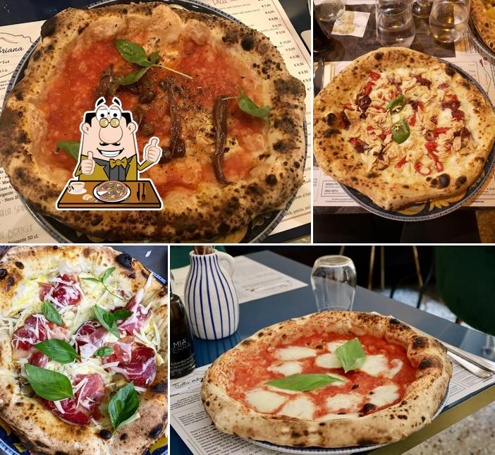 A Pizzeria Bella 'mbriana Trento, puoi goderti una bella pizza