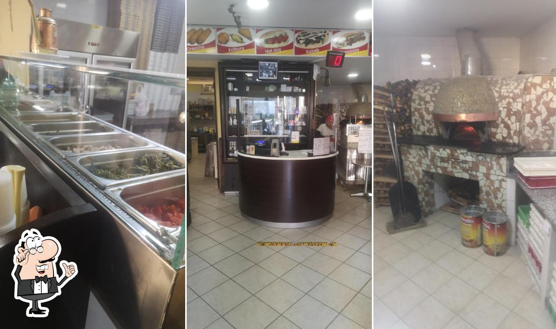 Dai un'occhiata agli interni di Pizzeria Aniello