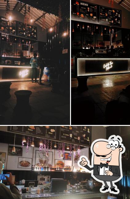 Take a seat at one of the tables at Chai Sutta Bar Yavatmal