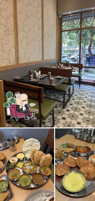 Take a seat at one of the tables at Shraavan Upahar Gruha