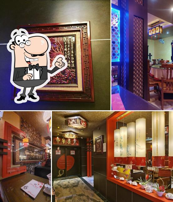 Take a seat at one of the tables at Chung Wah Chinese Restaurant