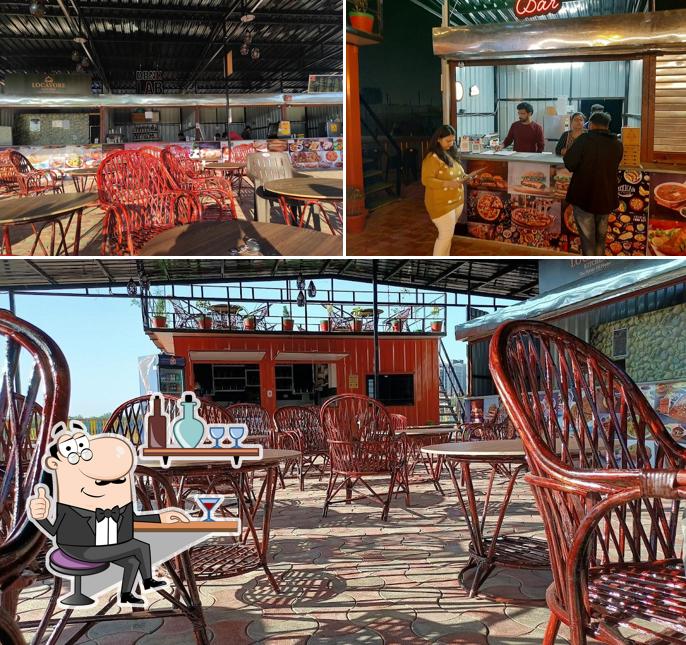 Take a seat at one of the tables at Patel's Cafe